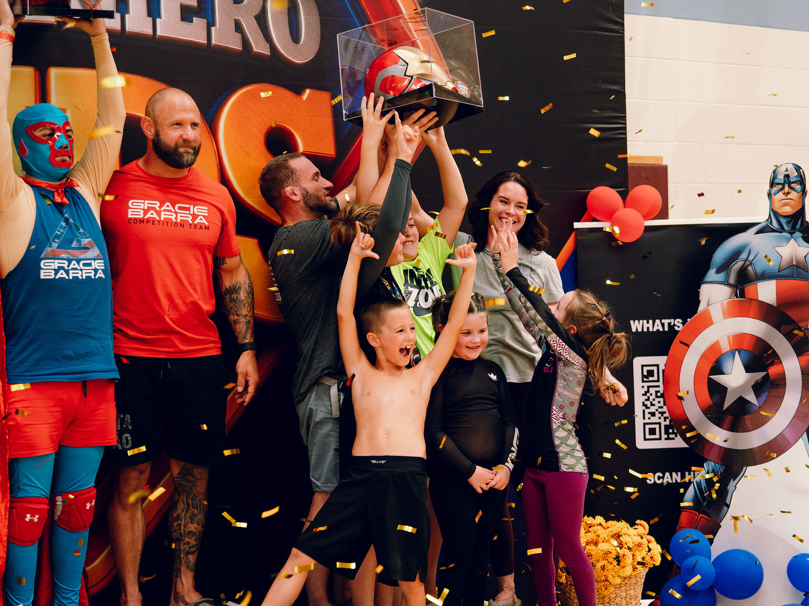 Trophy lift — Superhero Kids BJJ championship