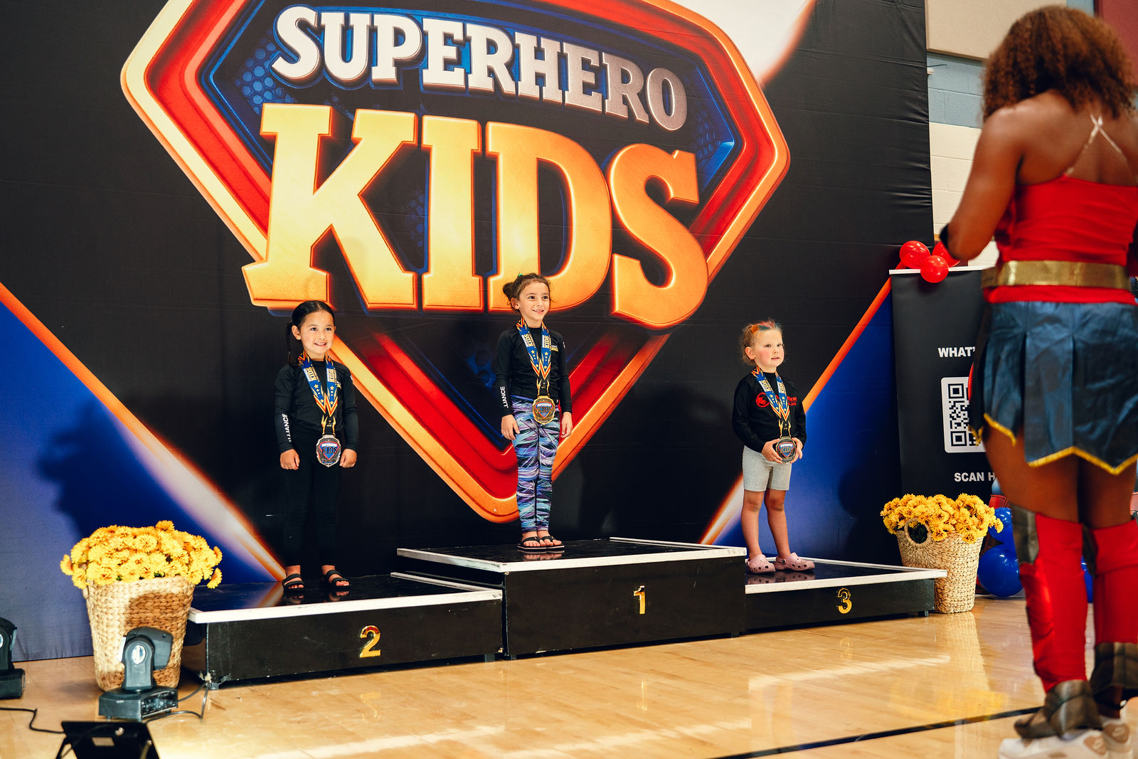 Podium ceremony — Superhero Kids BJJ championship